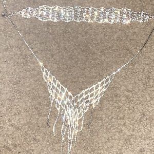 Jewelry, two necklaces,hoop earrings, an hair clip